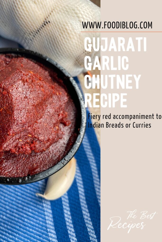 Gujarati Garlic Chutney served on a cloth, fiery red accompaniment to Indian Breads or Curry